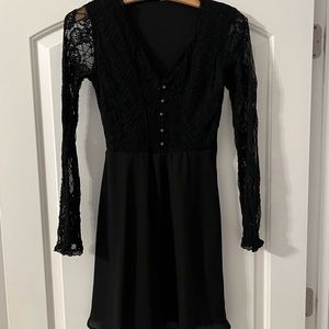 Black laced v-neck bodice with black sheer long sleeves and black flowing bottom